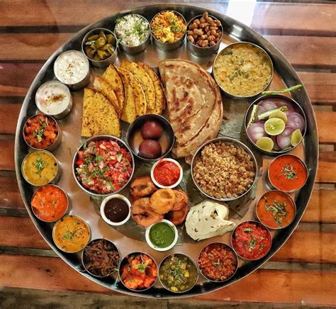 This Enormous Thali Includes More Than 25 Dishes Apart From The Two