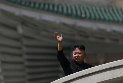 Kim Jong Un Waves Waves Holding Hands