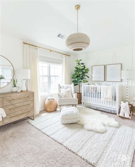 Beautiful Gender Neutral Nursery Design With White Walls And Woodland