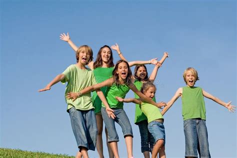 Group Of Kids Arms Raised Or Outstretched Group Of Happy Smiling Kids