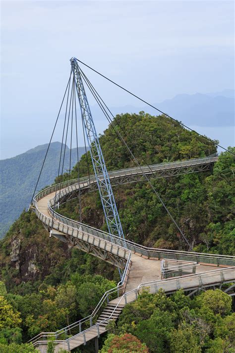 Get to the top station and optionally walk on to the famous curved langkawi sky bridge (at extra cost) and feel the fresh blowing mountain air and catch the panoramic view of the area. File:Langkawi Malaysia Langkawi-Sky-Bridge-01.jpg ...