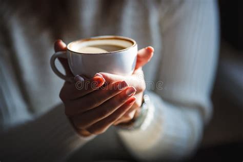 Woman Holds Hot Cup Of Coffee Warming Her Hands Stock Image Image Of
