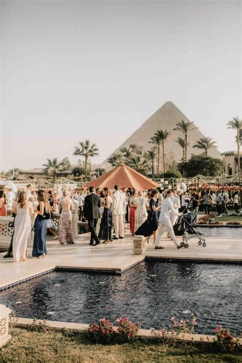 egypt wedding with bright flowers and laudae bridal gown rock my wedding
