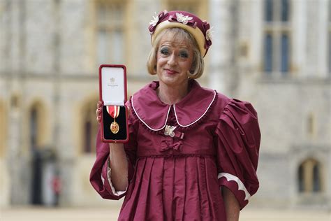 Grayson Perry Accepts Knighthood In Burgundy Taffeta Dress In Honour Of