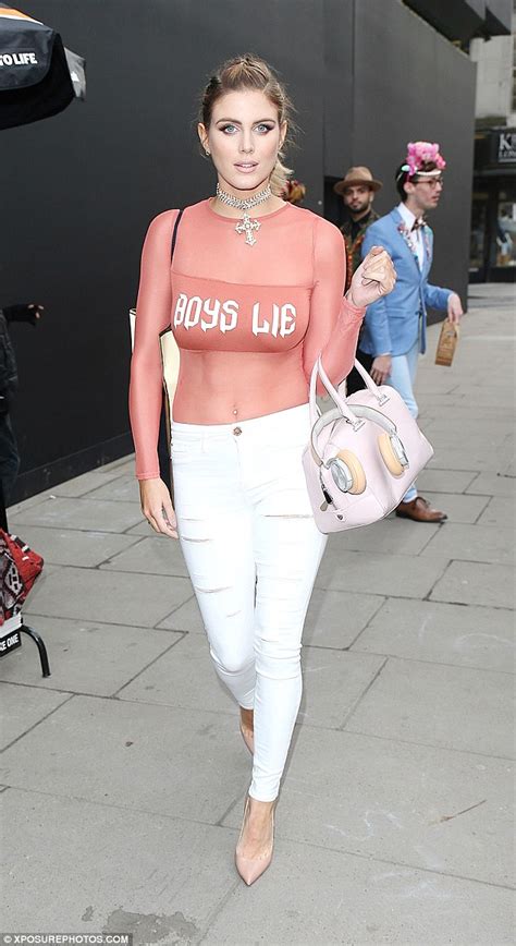 braless ashley james flaunts her stomach in sheer slogan top as she steps out during lfw after