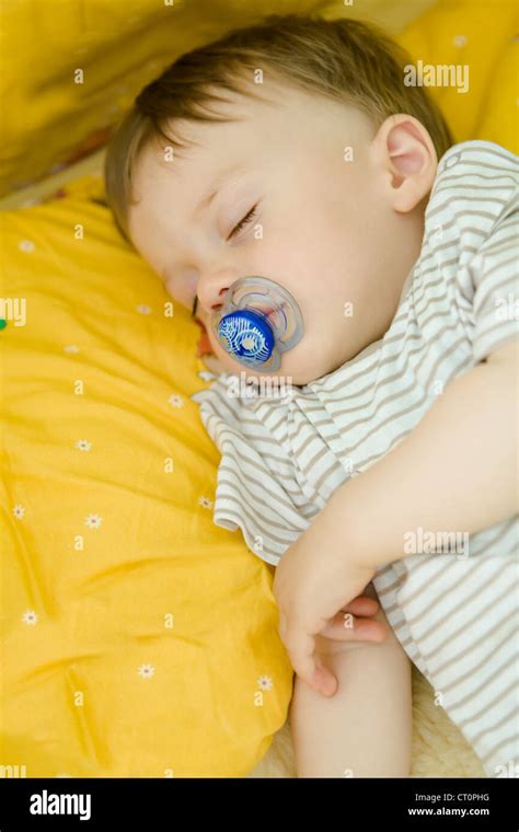 Little Baby Boy Sleeping In A Bed Stock Photo Alamy