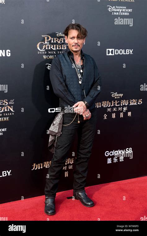 American Actor Johnny Depp Arrives On The Red Carpet For The Premiere