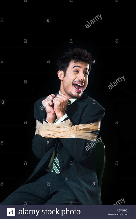 Page 2 Man Tied To Chair High Resolution Stock Photography And Images