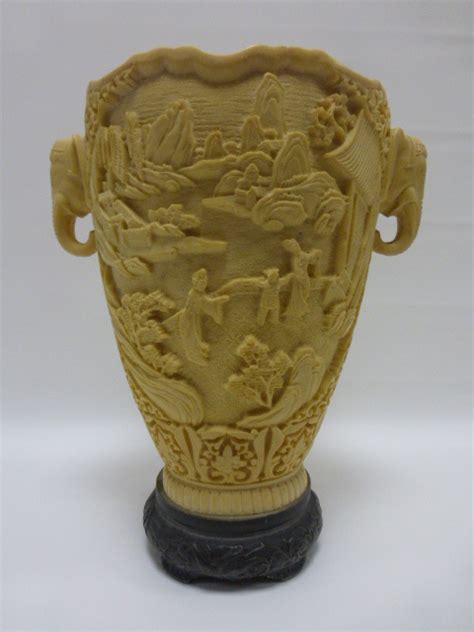 Chinese Faux Ivory Vase With Twin Elephant Head Handles Raised On