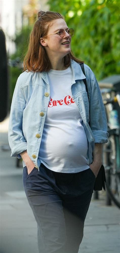 Pregnant Rose Leslie Showcases Her Growing Bump In A White T Shirt While Enjoying A Stroll In