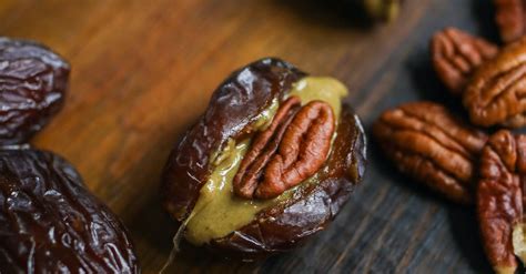 Photo Of Pecan On Wooden Surface · Free Stock Photo