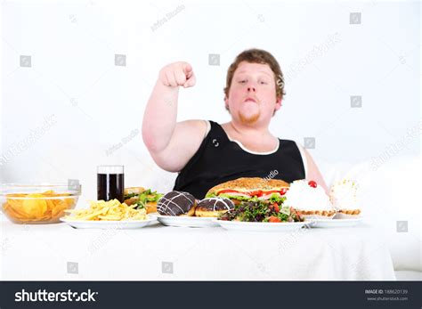 Fat Man Has Big Lunch On库存照片188620139 Shutterstock