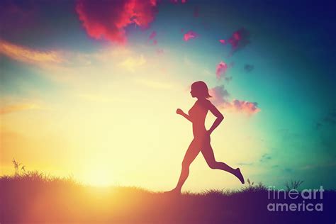 Silhouette Of Woman Running At Sunset Photograph By Michal Bednarek