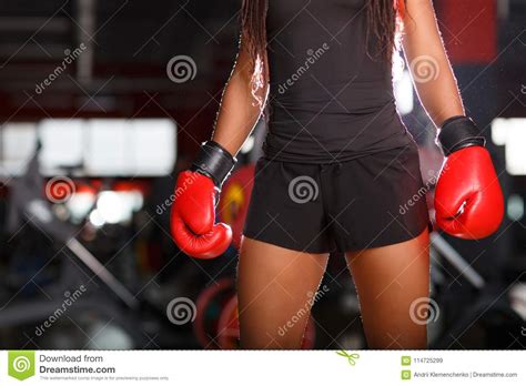 African Young Beautiful Woman S Body In Red Boxing Gloves In A Gym