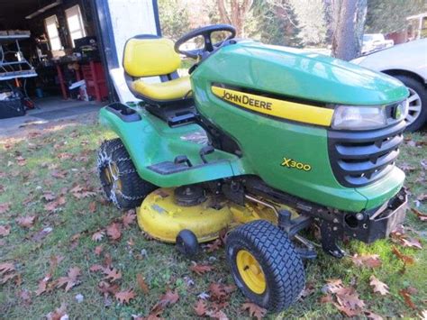 John Deere X300 Riding Lawn Mower Lambrecht Auction Inc