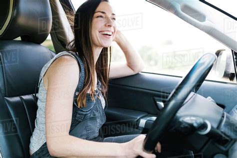 Smiling Woman Driving Car Stock Photo Dissolve