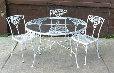 Large round protective outdoor garden patio table chair set furniture cover uk. Dining Table: Fascinating Round White Wrought Iron Outdoor ...