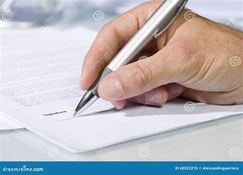 Close Up Shot Of Hand Signing A Document Stock Photo Image Of