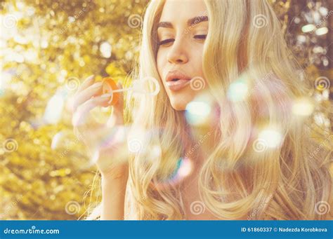 Beautiful Blonde Blowing Bubbles Stock Image Image Of Model Dress 61860337