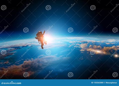 Spaceman And Planet Human In Space Concept Stock Photo Image Of