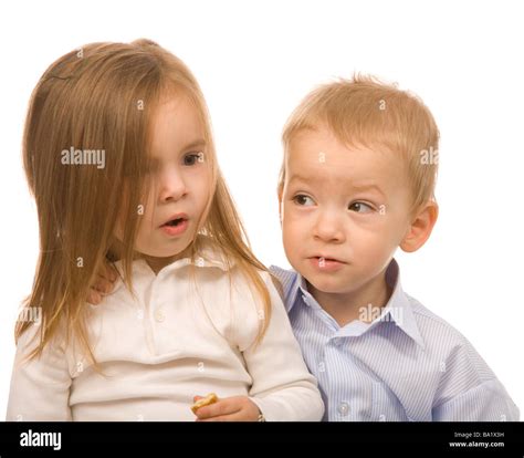 Little Boy And Girl On A White Background Stock Photo Alamy