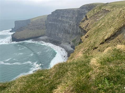 Cliff Face And Ocean At Cliffs Of Moher In County Claire Ireland Stock