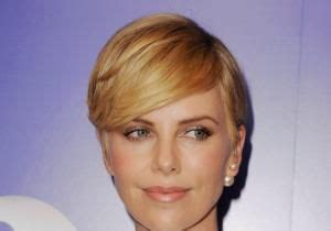 Charlize Theron Glows In White Dress Covers Neck Surgery Scar With