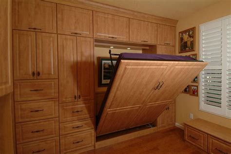 Ensure to leave a few inches between the side of your bed and night table. bedroom cabinets designs
