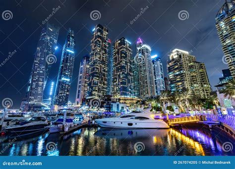 Marina With Yachts And Skyscrapers In Dubai Uae At Night Stock Image