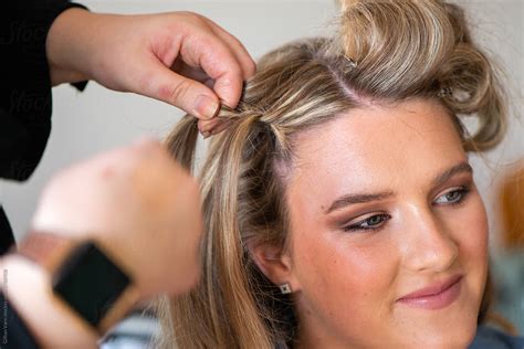 Hairdresser Braiding Hair By Stocksy Contributor Gillian Vann Stocksy