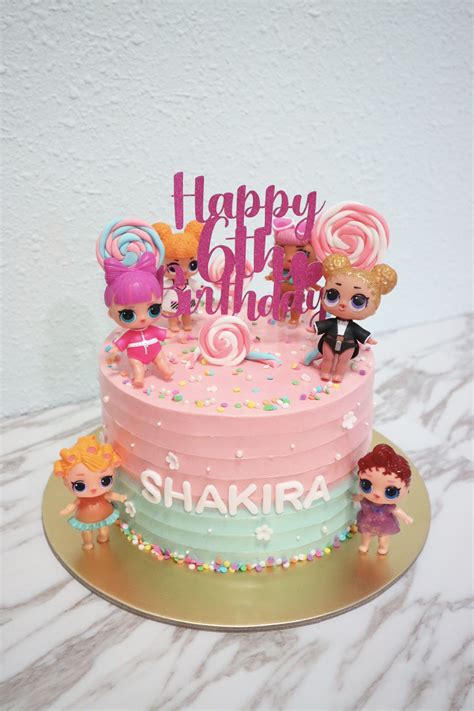 So this cake is an easy way to theme a cake by adding sweets and props, this was lol themed, but this style of cake can be adapted to any themed occa. LOL doll cake, Food & Drinks, Baked Goods on Carousell