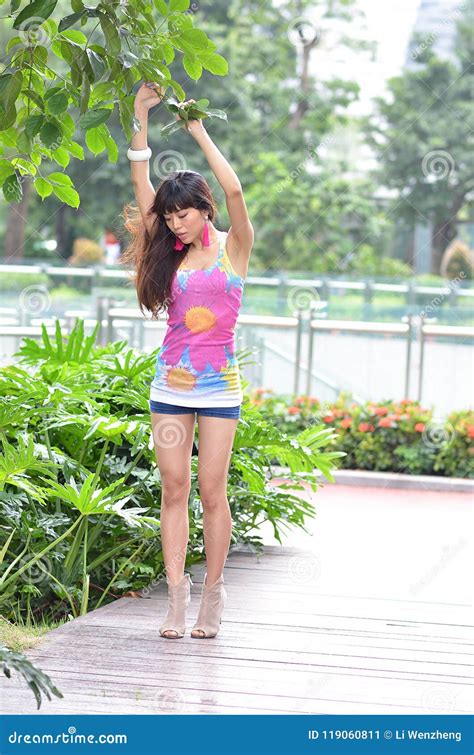 Beautiful Asian Girl Shows Her Youth In The Park Stock Image Image Of Girl Smile 119060811