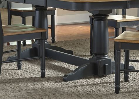 You can make your own table using a decorative pedestal available in most hardware stores. Springfield II Honey and Black Extendable Double Pedestal ...