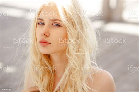Cute Blonde With Angelic Blue Eyescurl Hair And Big Lips Look Innocent