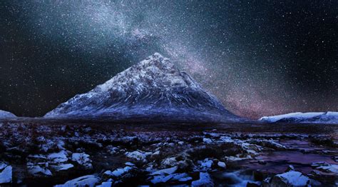 Snow Covered Mountain On Starry Night