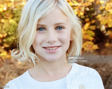 Close Up Of Blond Girl With Big Blue Eyes High Res Stock Photo Getty