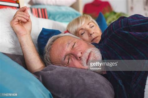 Old Man Sleeping In Bed Photos And Premium High Res Pictures Getty Images