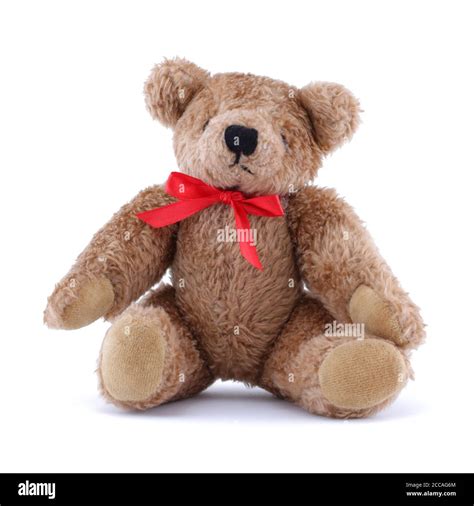 Teddy Bear With Red Ribbon Sitting On White Stock Photo Alamy