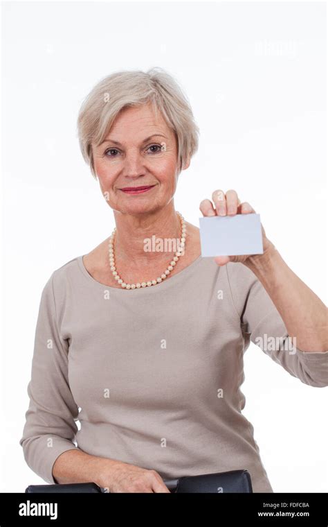 Beautiful Happy Smiling Older Senior Women Holding Sign With Text Space