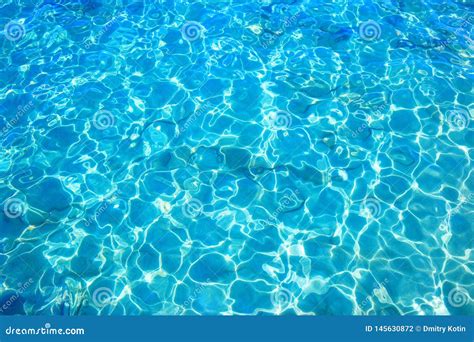 Blue Clear Water With Rippled Surface And Sand Bottom Stock Photo