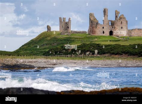 View Of Dunstanburgh Castle At Craster Northumberland Stock Photo Alamy
