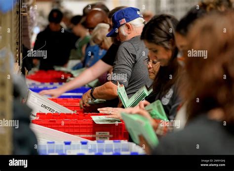 Election Workers Sort Early Ballots For Signature Verification Prior To