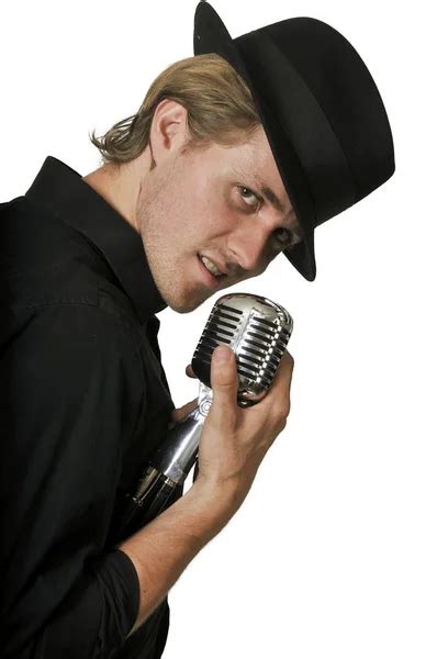 Man Singing Into Microphone Stock Photo By ©robeo123 125682936