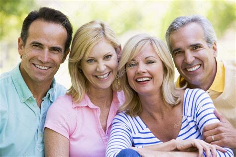 Two Couples Outdoors Smiling — Stock Photo © Monkeybusiness 4764079