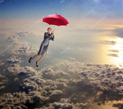 Dreamy Woman Flying In Sky With Umbrella — Stock Photo © Nomadsoul1