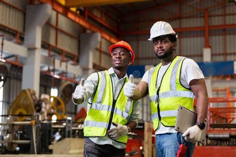 Two Man African American Engineer Workers Giving Thumbs Up Standing