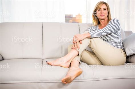 Woman Relaxing On The Sofa At Home Stock Images Free Women Relax