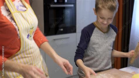 Son Helping Mom In The Kitchen They Paint A Happy Face Flour Preparation Of Dumplings