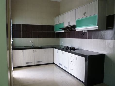 Kitchen in subang bestari consisting of base cabinet, tall cabinet and wall cabinets. Nova Kitchen & Deco Sdn Bhd: KITCHEN CABINET IN LIGHT CREAM WOODGRAIN MELAMINE ALUM EDGING WITH ...