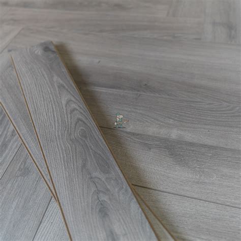Fusion Herringbone 12mm Moon Grey Oak 4v Laminate Flooring Flooring